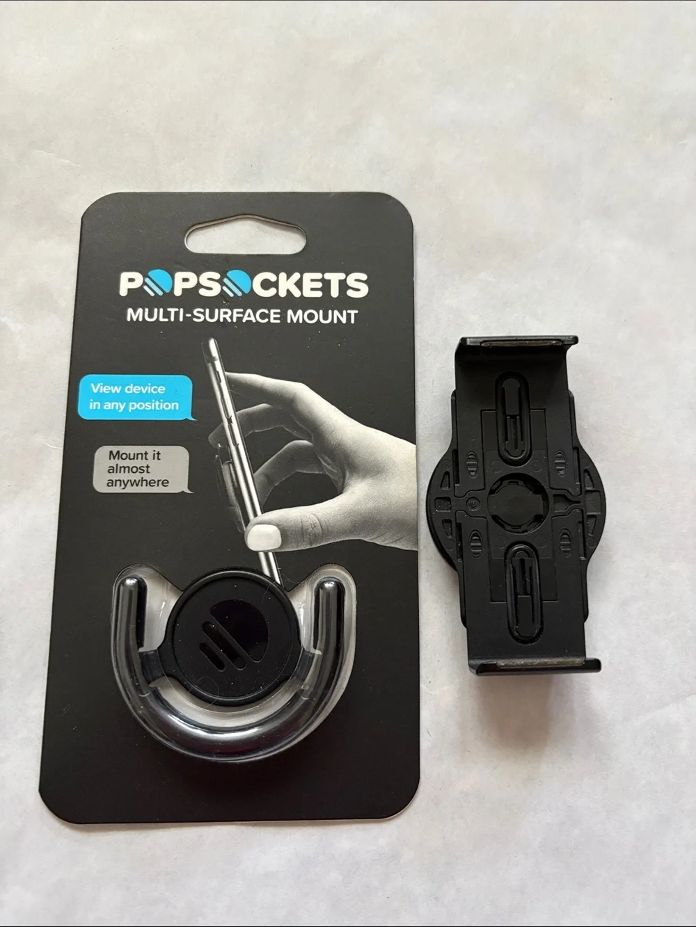 PopSockets Multi-Surface Mount with PopGrip Slide Stretch for phones and cases.